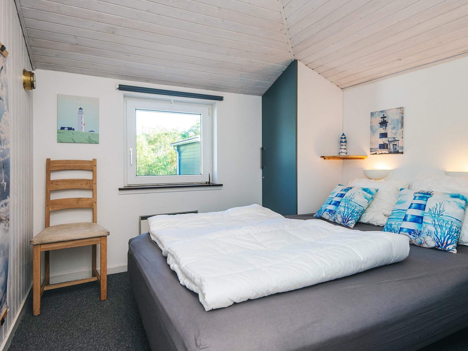 A bedroom with double bed and a window to the garden