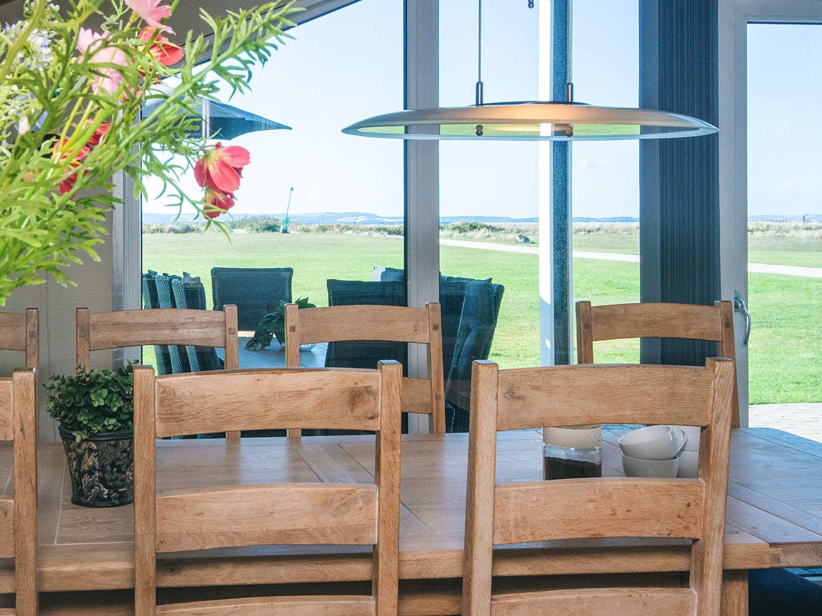 The dining end at the window, looking over the grass