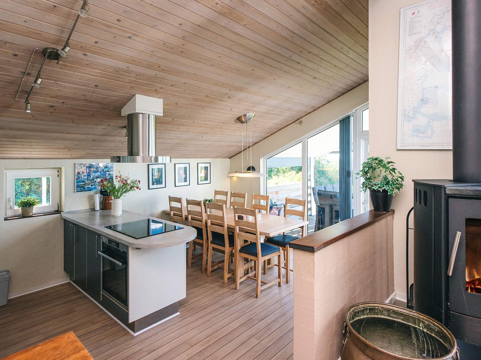 Kitchen and dining table, with the stove between the rooms